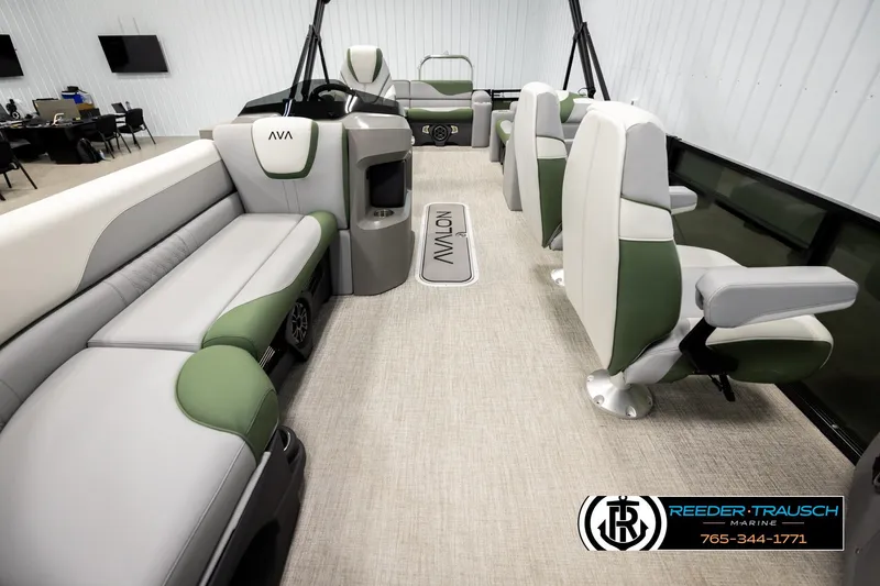 Slide: The Image of 2026 Avalon LSZ EL boat interior with green and gray seating, modern design. - 13