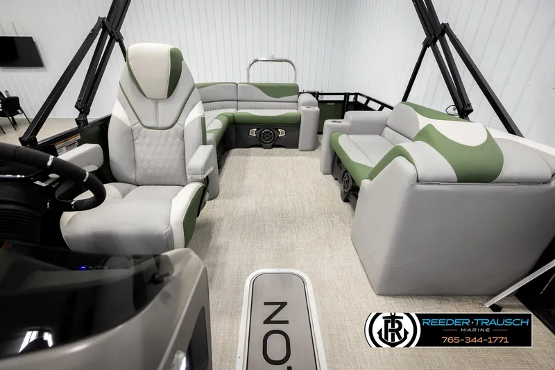 Slide: The Image of Luxurious interior of 2026 Avalon LSZ EL pontoon boat with plush seating and modern design. - 14