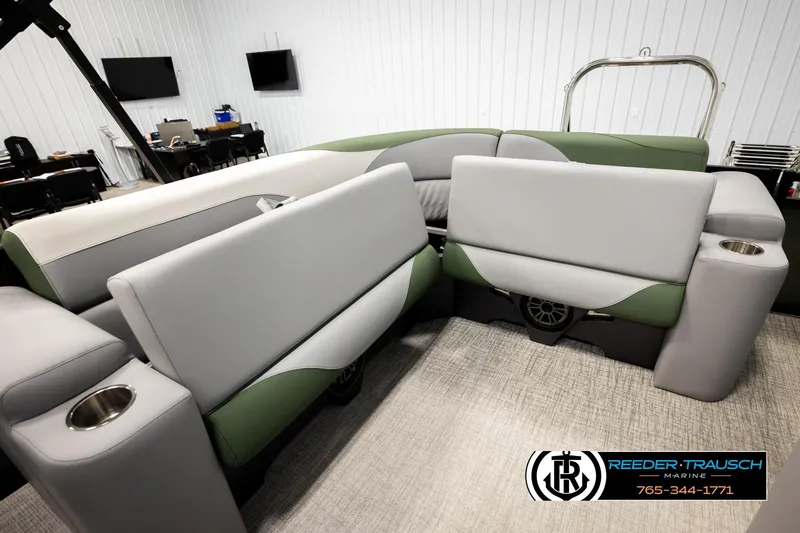 Slide: The Image of Luxurious interior of 2026 Avalon LSZ EL pontoon boat with modern seating and cup holders. - 22