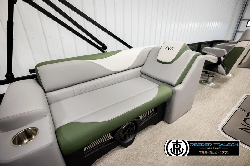 Slide: The Image of Luxurious seating in 2026 Avalon LSZ EL boat with green and gray upholstery. - 23