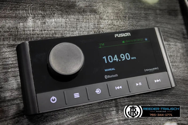 Slide: The Image of Fusion marine stereo display showing FM 104.90 MHz, Bluetooth enabled, in Avalon LSZ EL 2026. - 31