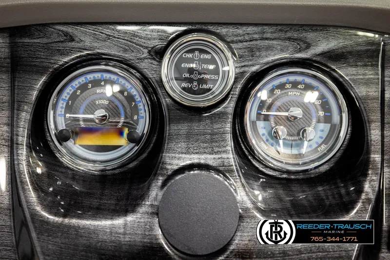 Slide: The Image of Dashboard of 2026 Avalon LSZ EL with gauges and Reeder-Trausch Marine logo. - 32