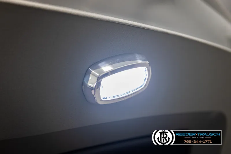 Slide: The Image of LED light on 2026 Avalon LSZ EL boat interior, Reeder-Trausch Marine branding visible. - 42