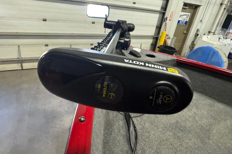 Slide: The Image of Minn Kota Ulterra motor on 2023 Tracker Pro Guide V-175 WT boat in garage. - 15