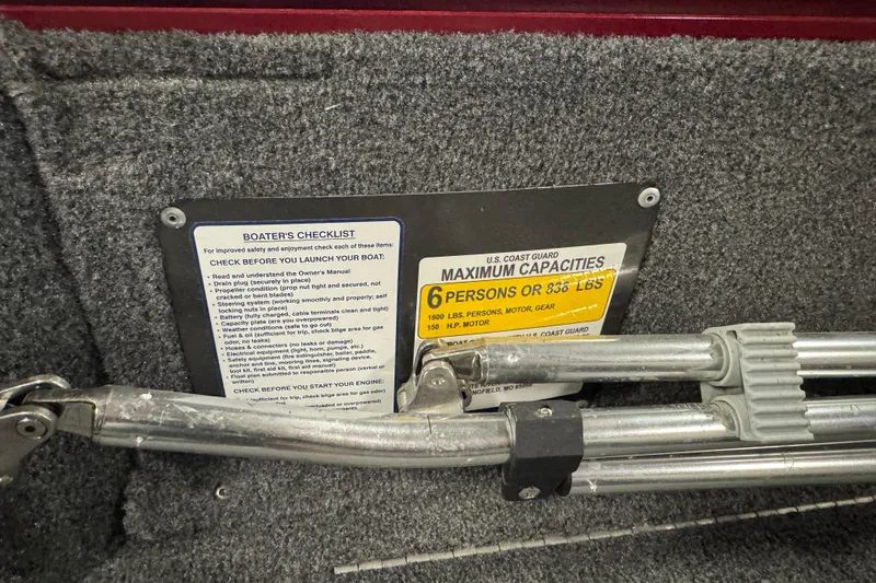 Slide: The Image of Boater's checklist and capacity label inside 2023 Tracker Pro Guide V-175 WT boat. - 9