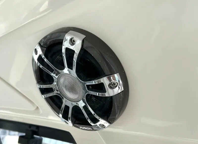 Slide: The Image of Close-up of a Fusion speaker on a 2019 Sea Ray Sundancer 350 Coupe boat. - 21