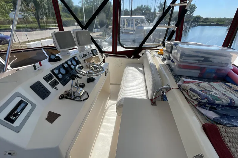 Slide: The Image of 1989 Jefferson 37 Sundeck interior with nautical decor and steps leading to deck. - 14