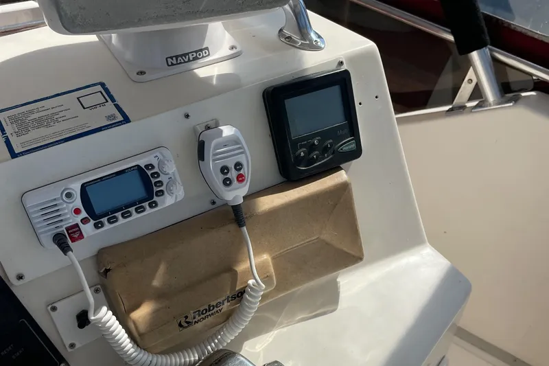 Slide: The Image of Interior view of 1989 Jefferson 37 Sundeck boat cockpit with steering wheel and controls. - 18