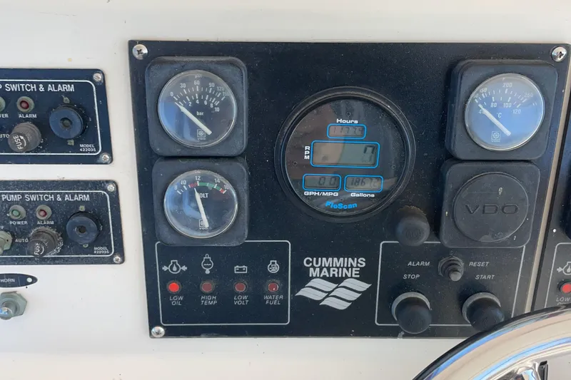 Slide: The Image of Interior of 1989 Jefferson 37 Sundeck boat with steering wheel and seating area. - 20