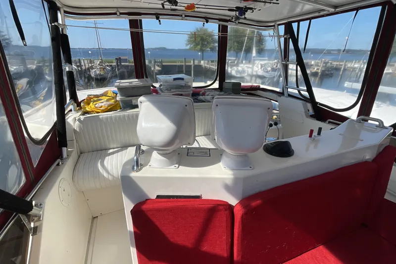 Slide: The Image of Control panel of a 1989 Jefferson 37 Sundeck boat with Cummins Marine gauges. - 23