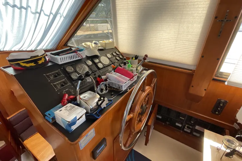 Slide: The Image of Cozy interior of 1989 Jefferson 37 Sundeck with TV, fan, and decor. - 27