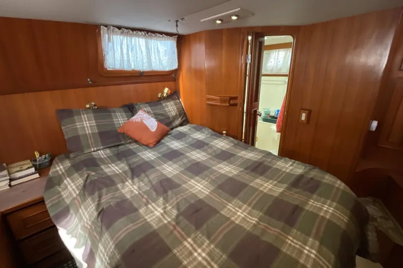 Slide: The Image of Shower area in 1989 Jefferson 37 Sundeck yacht with porthole and grab bar. - 47