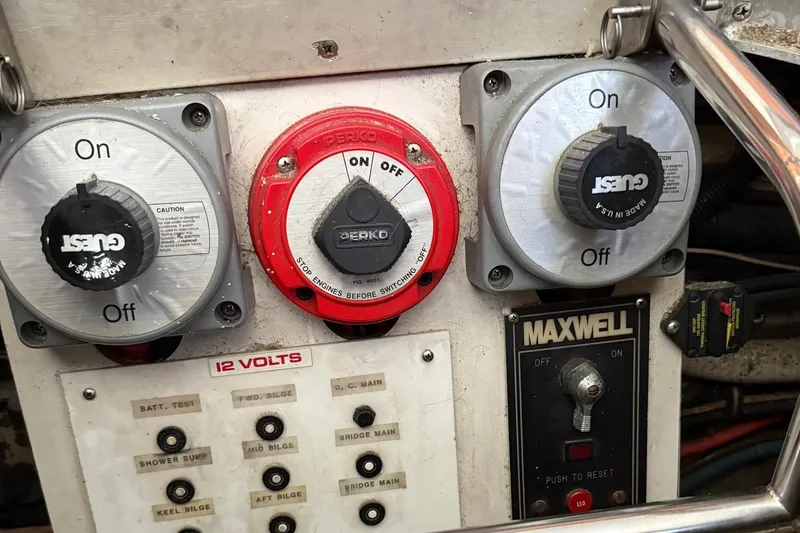 Slide: The Image of Control panel of a 1991 Tiara Yachts 4300 Convertible with switches and voltage indicators. - 10