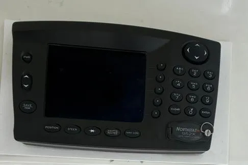 Slide: The Image of Navigation system on a 1991 Tiara Yachts 4300 Convertible boat. - 41