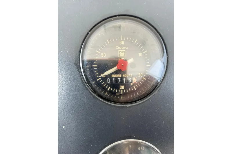 Slide: The Image of Close-up of engine hour meter on 1991 Tiara Yachts 4300 Convertible, showing 1761 hours. - 44