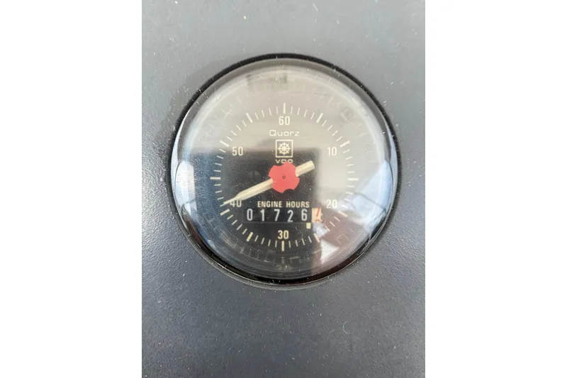 Slide: The Image of Engine hour meter showing 1726 hours on 1991 Tiara Yachts 4300 Convertible. - 59