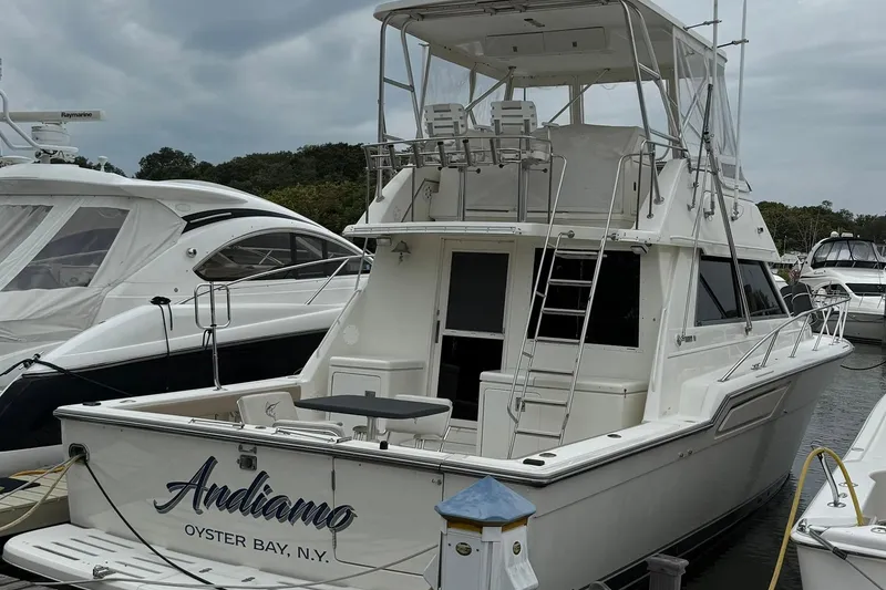 Slide: The Image of 1991 Tiara Yachts 4300 Convertible docked at Oyster Bay, N.Y., named "Andiamo." - 70