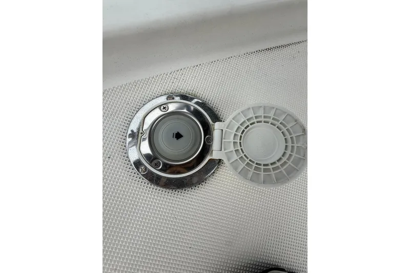Slide: The Image of Fuel cap on 1991 Tiara Yachts 4300 Convertible boat deck. - 77