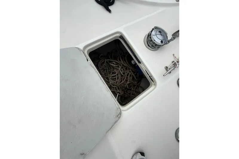 Slide: The Image of Open hatch with ropes on 1991 Tiara Yachts 4300 Convertible deck. - 8