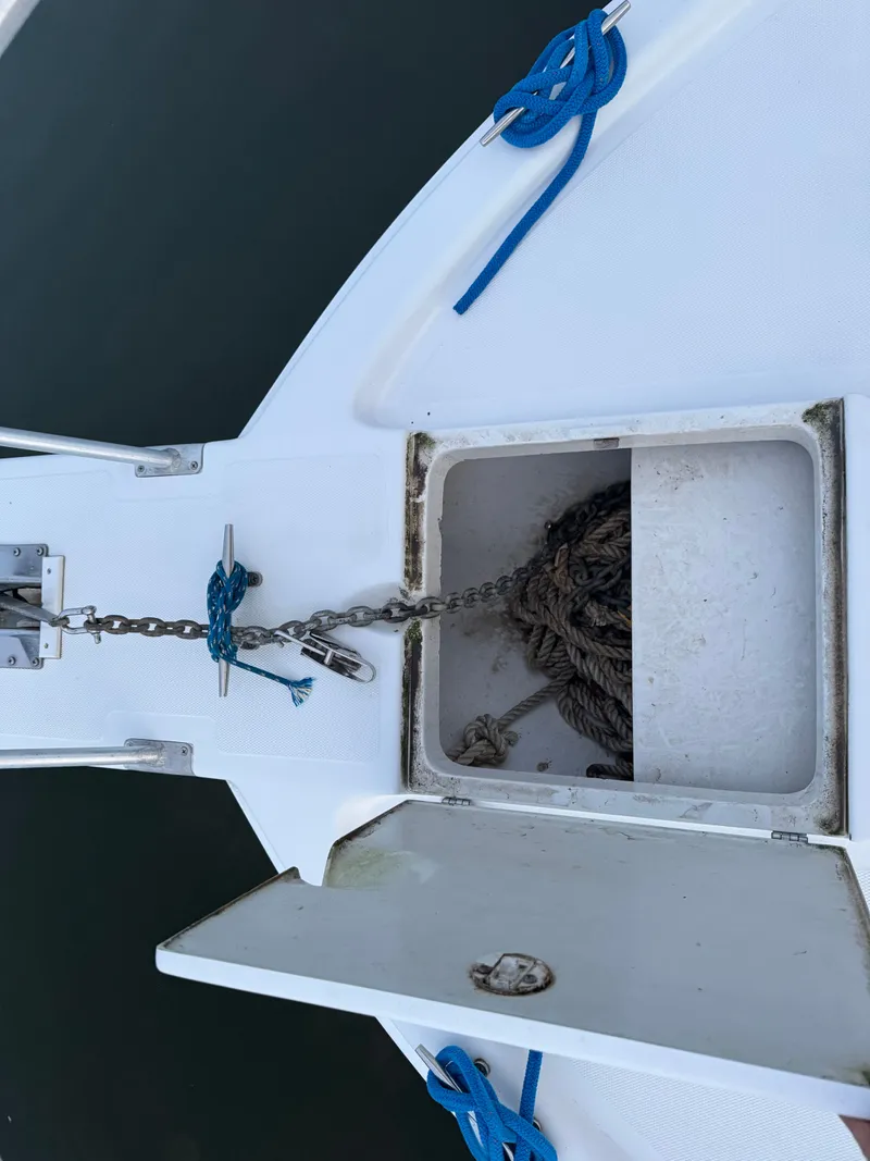 Slide: The Image of Anchor chain and rope storage on 1999 Mainship Pilot 30 Sedan boat. - 29