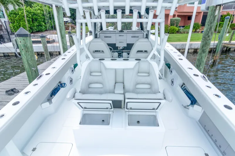 Slide: The Image of 2022 Freeman 37 VH boat interior with seating, storage, and navigation equipment. - 11