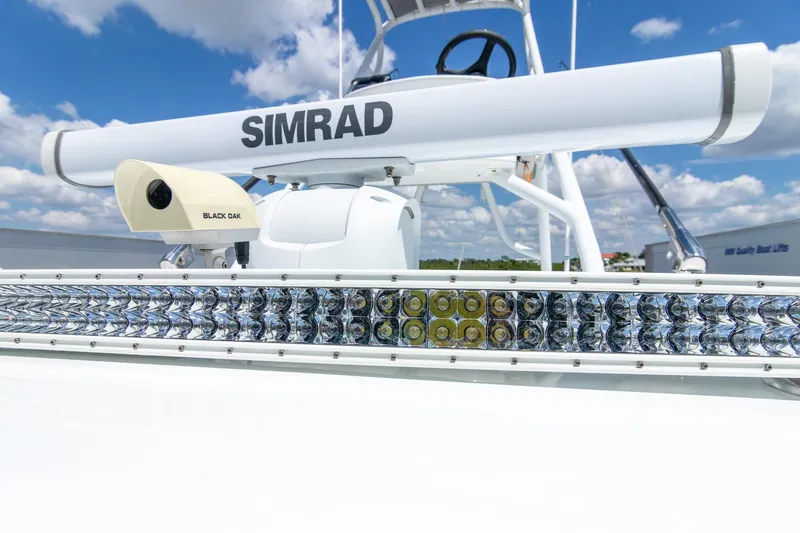 Slide: The Image of Freeman 37 VH 2022 boat with Simrad radar and Black Oak light bar. - 19