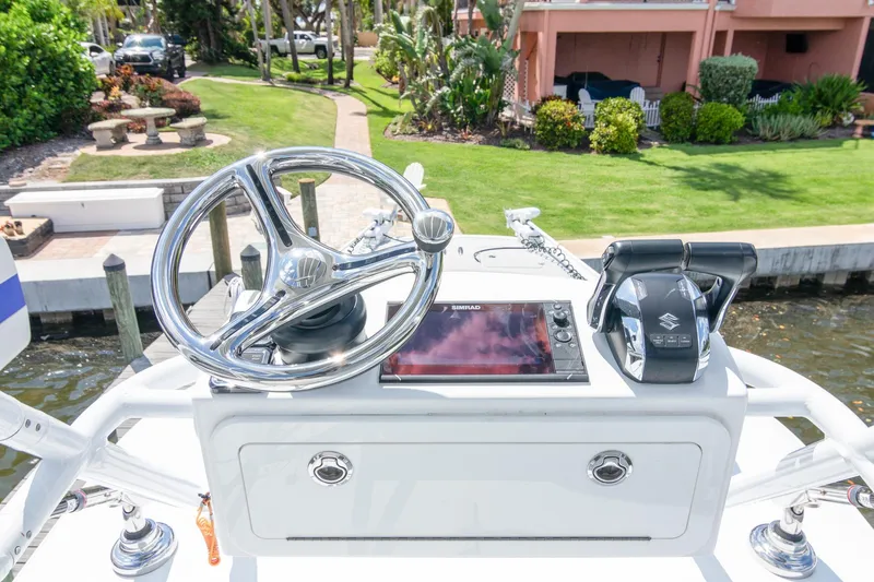 Slide: The Image of Helm of 2022 Freeman 37 VH boat with steering wheel and controls. - 20