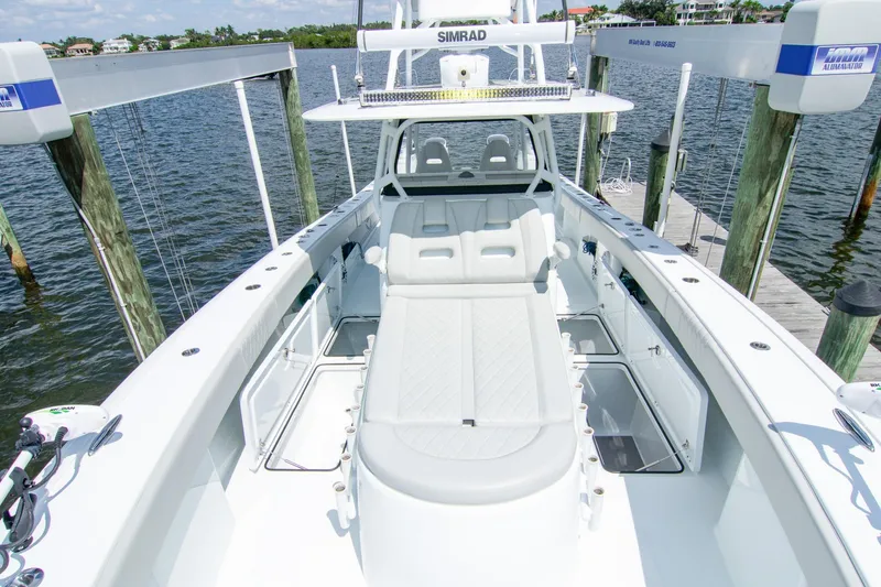 Slide: The Image of 2022 Freeman 37 VH boat docked, featuring spacious deck and modern design. - 25