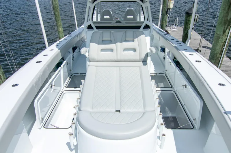 Slide: The Image of 2022 Freeman 37 VH boat interior with cushioned seating and storage compartments. - 26