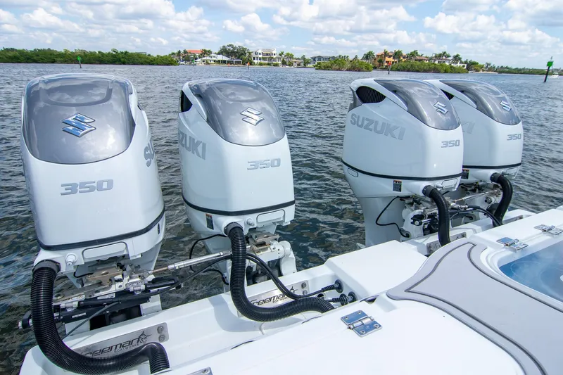 Slide: The Image of Four Suzuki 350 outboard engines on a 2022 Freeman 37 VH boat. - 36