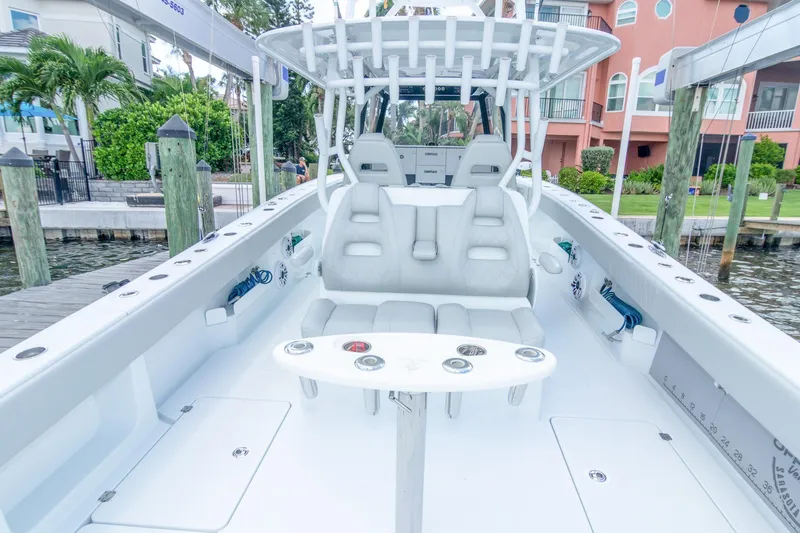 Slide: The Image of 2022 Freeman 37 VH boat interior with white seating and modern design. - 39