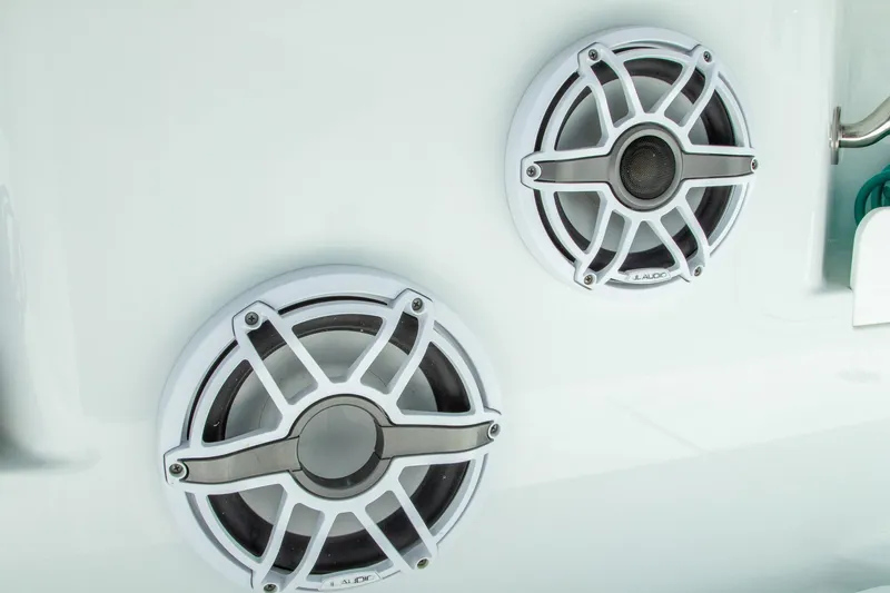 Slide: The Image of White JL Audio speakers on a Freeman 37 VH boat, 2022 model. - 42