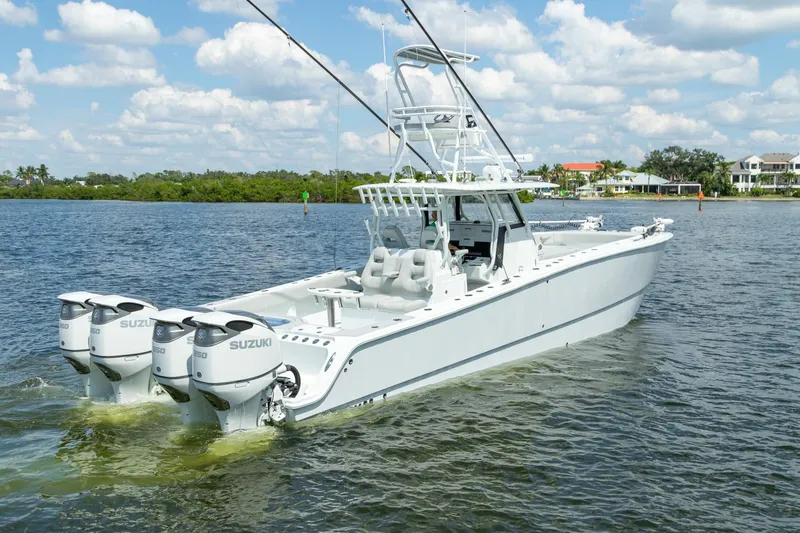 Slide: The Image of 2022 Freeman 37 VH boat with Suzuki engines on a sunny day. - 46