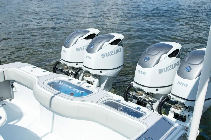 Slide: The Image of Freeman 37 VH 2022 boat with four Suzuki 350 outboard engines on water. - 50