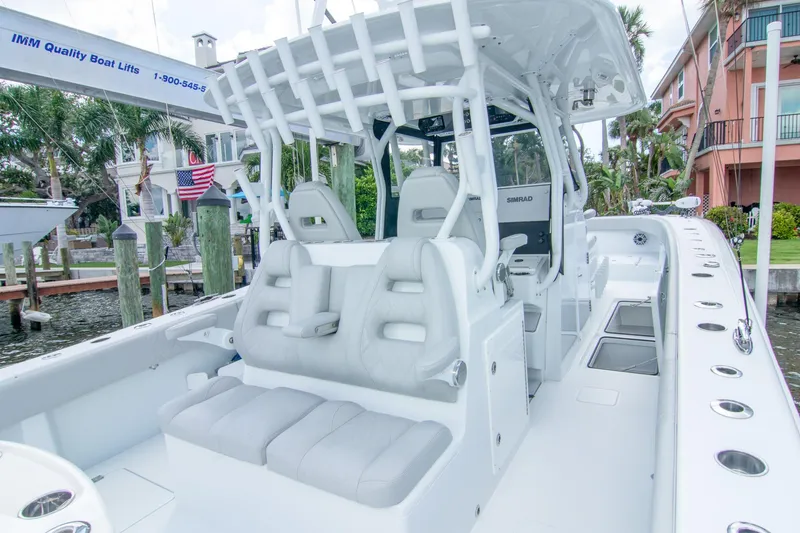 Slide: The Image of 2022 Freeman 37 VH boat interior with white seating and modern design. - 6
