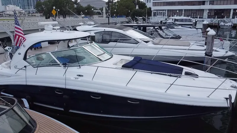 Slide: The Image of 2005 Sea Ray 420 Sundancer yacht docked at marina. - 11