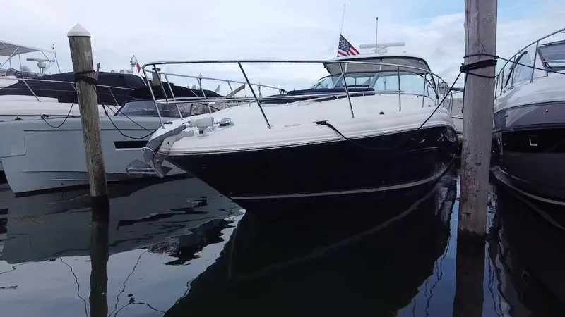 Slide: The Image of 2005 Sea Ray 420 Sundancer yacht docked at marina. - 6