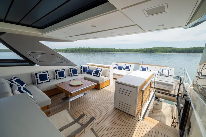 Slide: The Image of Luxurious 2024 Sanlorenzo SL90A yacht deck with elegant seating and scenic water view. - 22