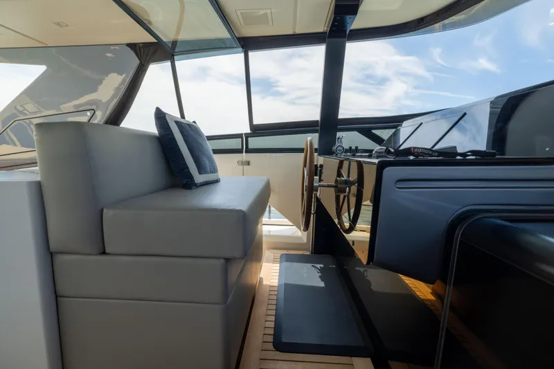 Slide: The Image of 2024 Sanlorenzo SL90A yacht helm with modern design and luxurious seating. - 28