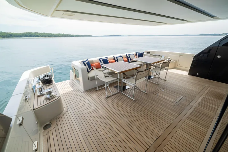 Slide: The Image of Luxurious 2024 Sanlorenzo SL90A yacht deck with elegant seating and ocean view. - 39