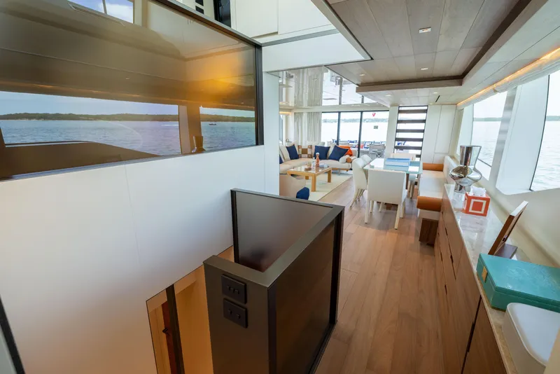 Slide: The Image of Luxurious interior of 2024 Sanlorenzo SL90A yacht with modern furnishings and panoramic windows. - 46