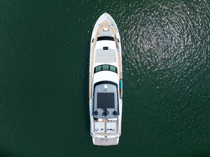 Slide: The Image of Aerial view of 2024 Sanlorenzo SL90A yacht on shimmering water. - 8