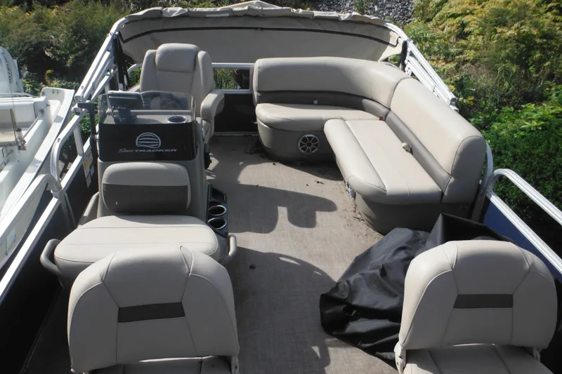 Slide: The Image of 2024 Sun Tracker Bass Buggy 16 XL Select logo on dark blue background. - 10