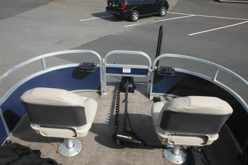 Slide: The Image of 2024 Sun Tracker Bass Buggy 16 XL Select dashboard with RPM gauge and throttle control. - 15