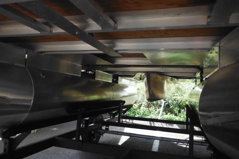 Slide: The Image of Label on a 2024 Sun Tracker Bass Buggy 16 XL Select trailer, detailing specifications and compliance. - 6