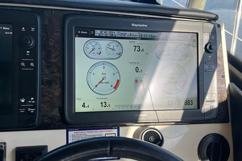 Slide: The Image of Raymarine display on 2015 Sea Ray 470 Sundancer showing navigation and engine data. - 17