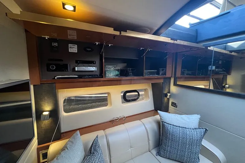 Slide: The Image of Luxurious interior of 2015 Sea Ray 470 Sundancer yacht with modern amenities and comfortable seating. - 41