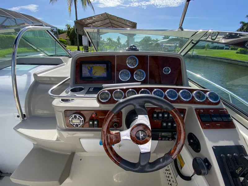 Slide: The Image of 2003 Formula 37PC boat helm with navigation system and gauges. - 19