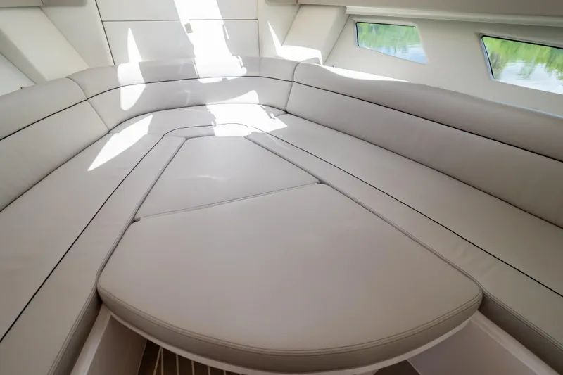 Slide: The Image of 2023 Intrepid 345 Valor interior with luxurious seating and modern design. - 10