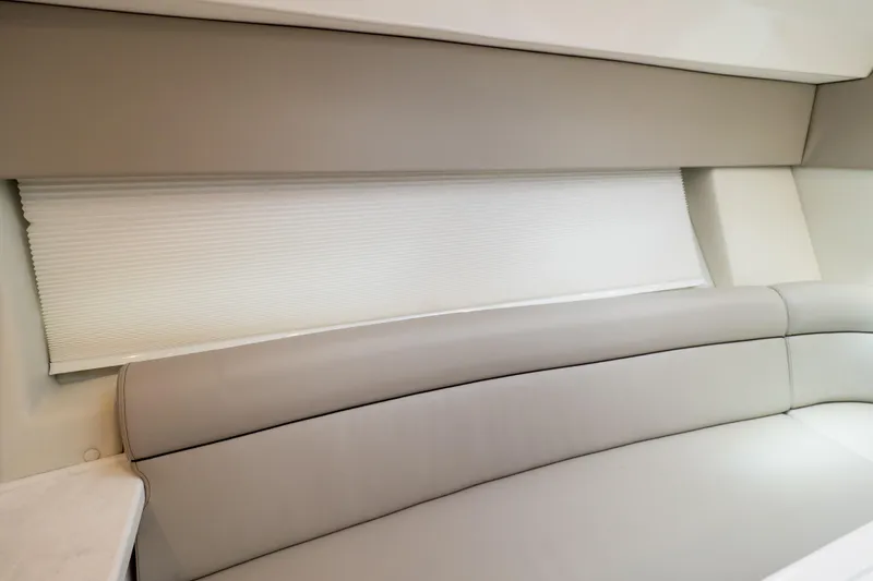 Slide: The Image of Interior of 2023 Intrepid 345 Valor boat with sleek, modern seating design. - 105